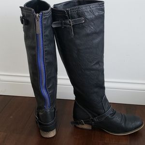 Tall zip up boots.